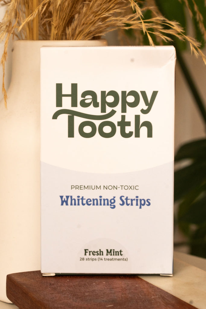Front of Happy Tooth Whitening Strips box