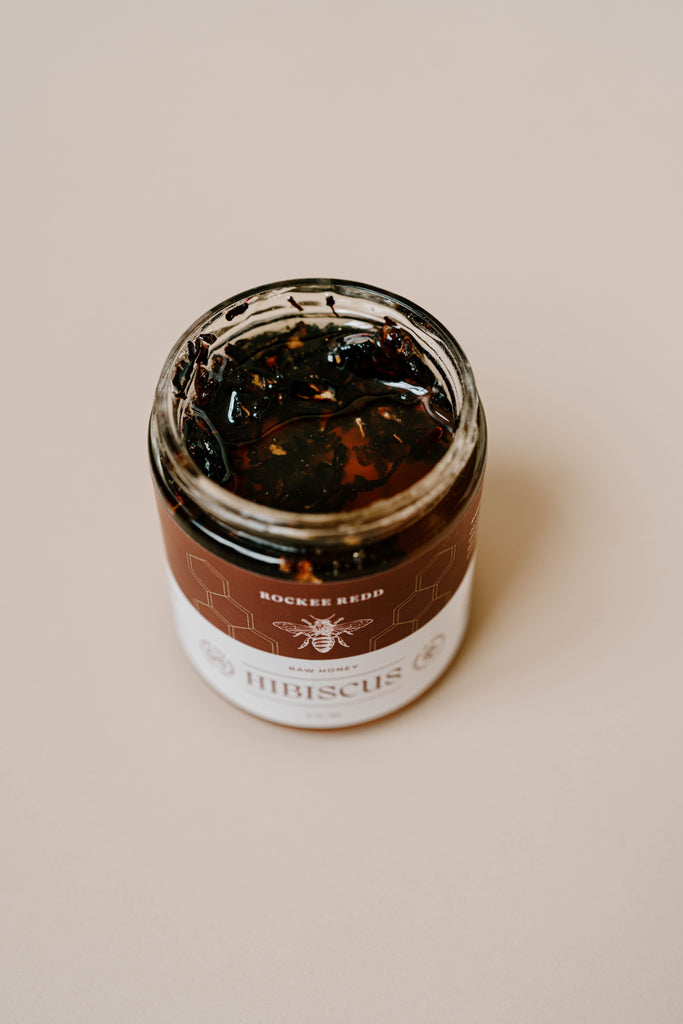 Opened jar of Rockee Redd Hibiscus Honey