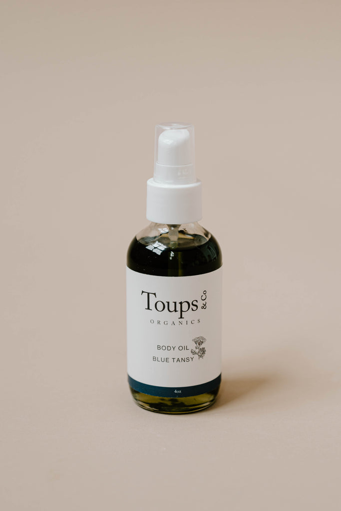 Bottle of Toups and Co Organic Body Oil